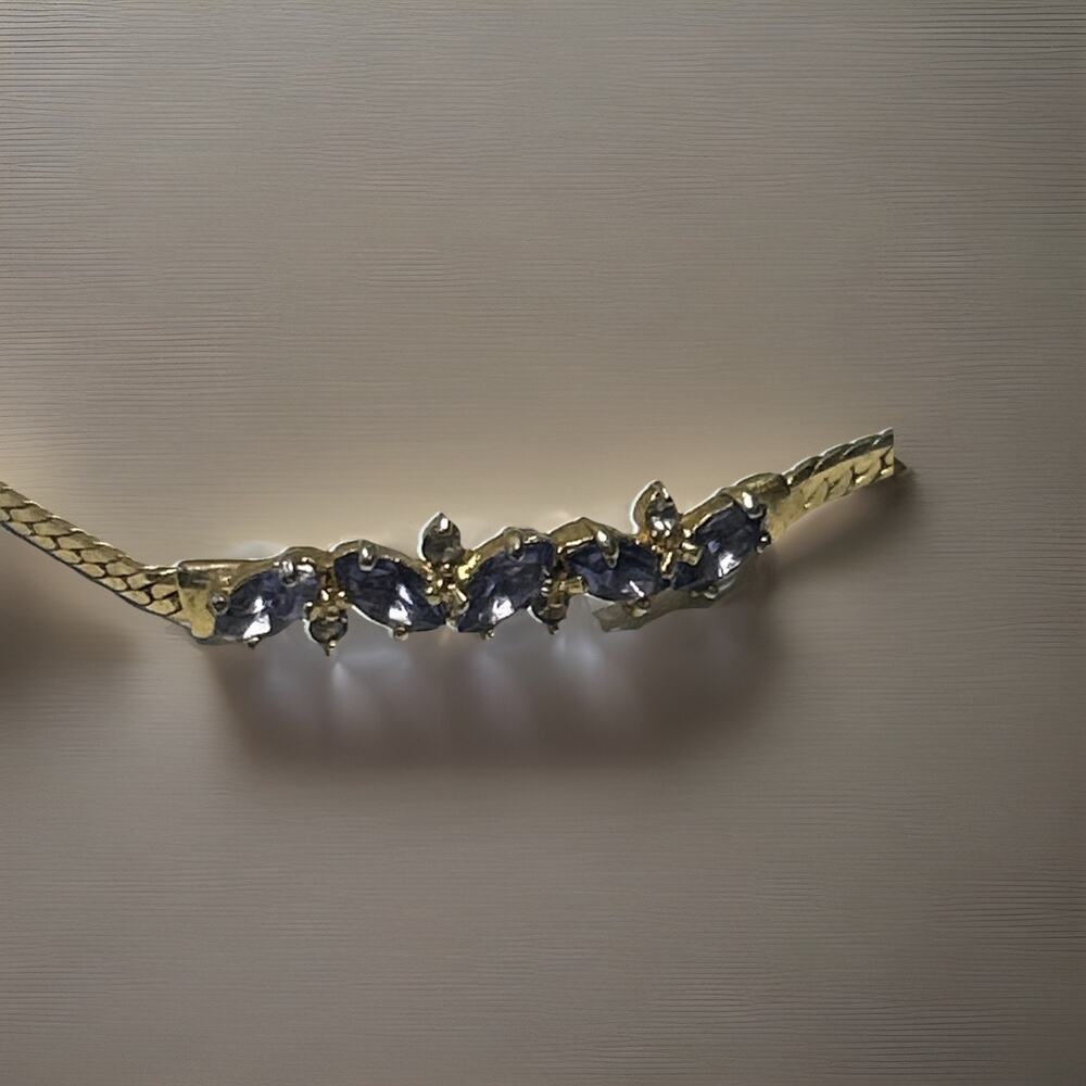 Vintage Avon bracelet with faux tanzanite diamonds in gold over sterling silver